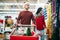 Young couple purchasing holiday decorations