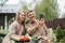 A young couple quarantined during covid-19 at their country home get in touch via video call with their parents. Picnic