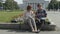 Young couple reading in park