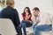 Young couple at a reception with a psychologist