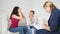 Young couple at a reception with a psychologist.