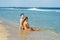 Young couple relaxing on the beach in New Jersey, USA