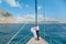 Young Couple Relaxing on a Yacht. Happy wealthy man and a woman by private boat have sea trip.