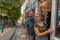 Young couple riding a famous funicular in Lisbon. Elevador Da Gloria