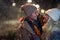 A young couple in romantic moments on a snowy weather in the city. Love, together, walk, snow, city