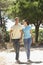 Young Couple On Romantic Walk In Countryside