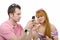 Young couple sending text messages on their phones
