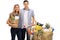 Young couple with a shopping bag and a cart filled with grocerie