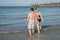 Young couple on the shore of the Gulf of Mexico, Florida USA