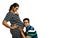 A young couple showing a pregnant lady in inquisitive expression with her husband placing ear on her belly in white background