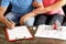 Young Couple Signing Loan Contract For A House