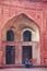 Young couple sitting in the courtyard of Jahangiri Mahal in Agra