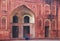 Young couple sitting in the courtyard of Jahangiri Mahal in Agra