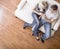 Young Couple Sitting on Love Seat