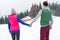 Young Couple Snowy Village Wooden Country House Man And Woman Winter Snow Resort Cottage