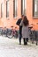 Young couple standing in a street in autumn