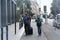 Young couple with suitcases and backpacks