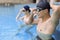 Young couple swimmers preparing to race at the swimming pool