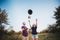 Young couple tossing hats into the air