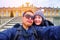 Young Couple Tourists selfie with smartphone at Sans Souci palace in Potsdam, Berlin, Germany