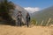 Young couple travellers trekking in Poon Hill view point in Ghorepani, Nepal