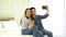 Young Couple video call and going on vacation in a foreign country. Young Couple selfie happy and go on the travel. Asian female a