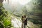 Young couple with view of Ubud in morning. Happy together, honeymoon in Bali.