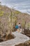 Young Couple Walking at Galapagos Touristic Trail