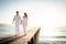 Young Couple Walking On Pier