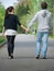 Young couple walking together in park