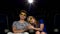 Young couple watching a film at the cinema, 3D