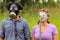 Young Couple Wearing Gas Masks