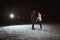 Young couple in winter skate rink