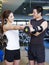 Young couple working out in gym