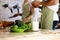 Young couples are enjoying cooking at the kitchen in working from home.