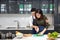 Young couples are helping to chop vegetables in the kitchen. Asian couple cooking together at the kitchen