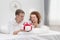 Young couples in love surprise gift box in bedroom,Celebrating Valentine`s Day