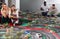 Young couples play a game slot car racing track