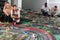 Young couples play a game slot car racing track