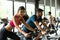 Young couples work out at the gym to strengthen the body