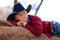 Young cowboy reclining