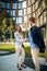 Young coworkers shaking hands while standing outdoor.meeting of  business partners