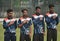 Young cricketers are showing respect to the National Anthems