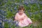 Young Crying  Girl in Field of Blue Bonnet Flowers