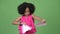 Young cute African girl with Afro hair ripping paperwork