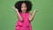 Young cute African girl with Afro hair shrugging shoulders