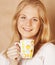 Young cute blond girl drinking coffee close up on