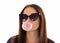 Young cute girl chews bubble gum, isolated