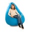 Young cute girl smiling while sitting on blue beanbag