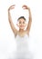 Young cute little girl ballet dancer dancing on white background
